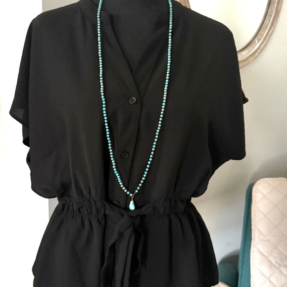 Timing Tops - This is like new black top with a tie waist and buttons.